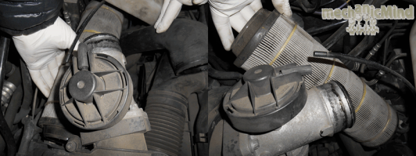 Figura 5: Estraiamo il vecchio filtro tirandone la coda verso l'alto e poi verso fuori