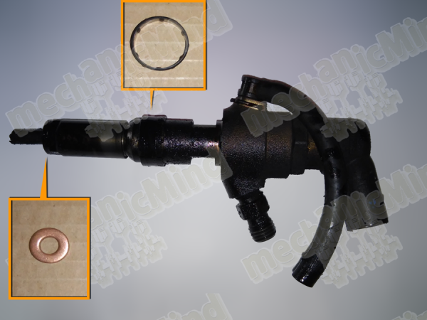 Figura 4: Sono indicate 2 delle 3 guarnizioni da rimuovere